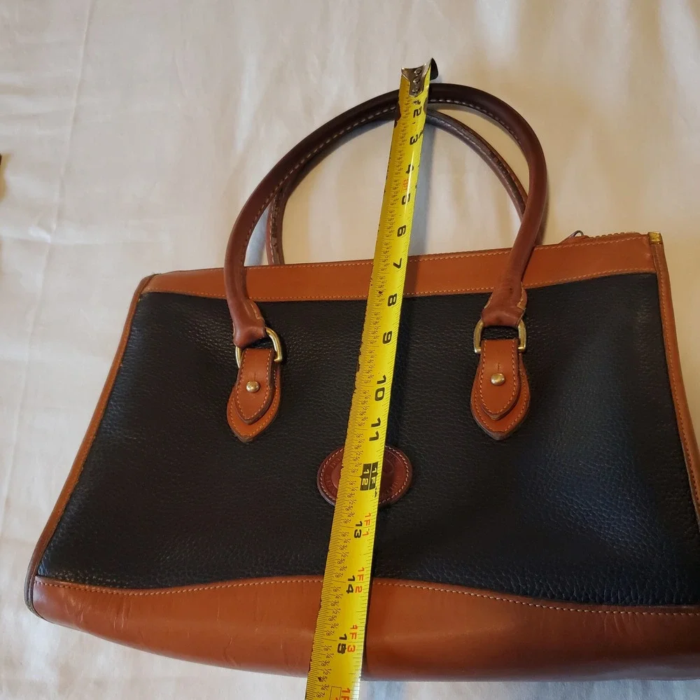 Dooney & Bourke Vintage All Weather Leather Tote Navy Blue Tan Brass Duck Fob